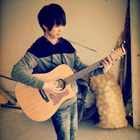 小文和他的吉他🎸照片